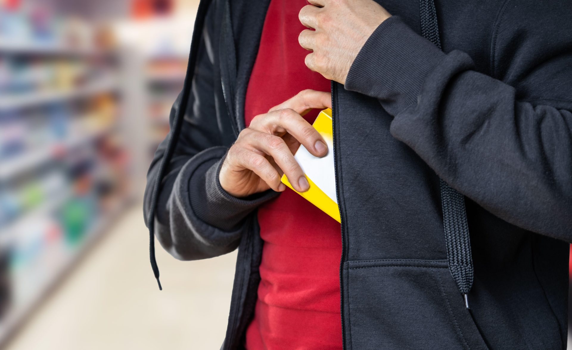 File photo shows a man stealing in a supermarket.