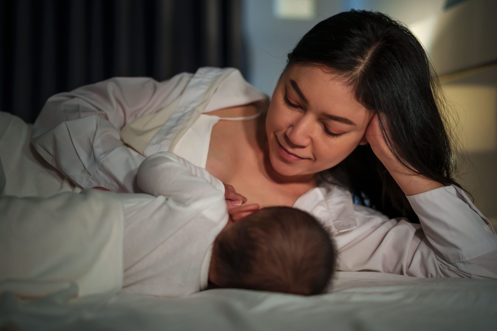 A breastfeeding mother.