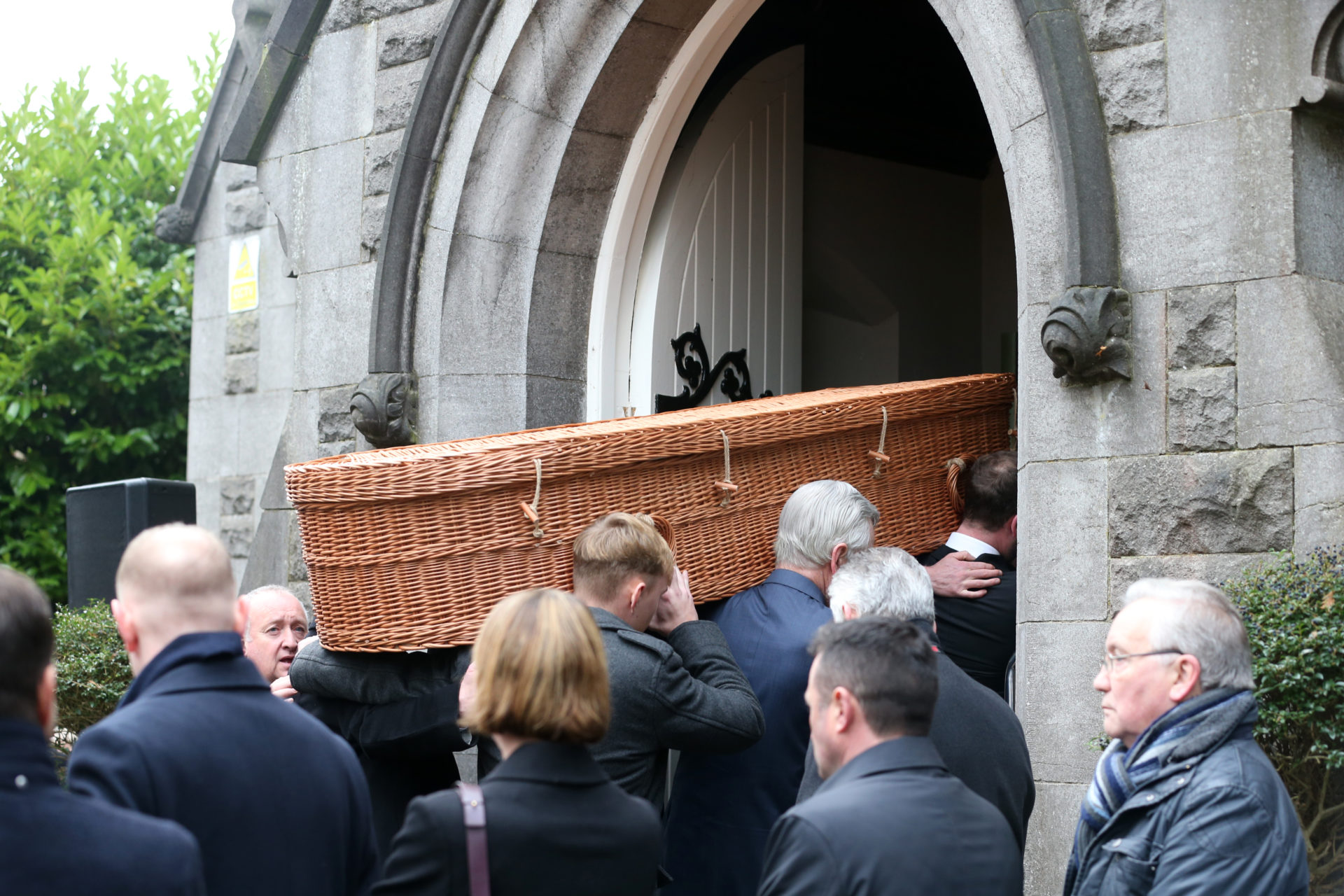 Mourners carry Ben Dunne’s casket at his funeral in Dublin