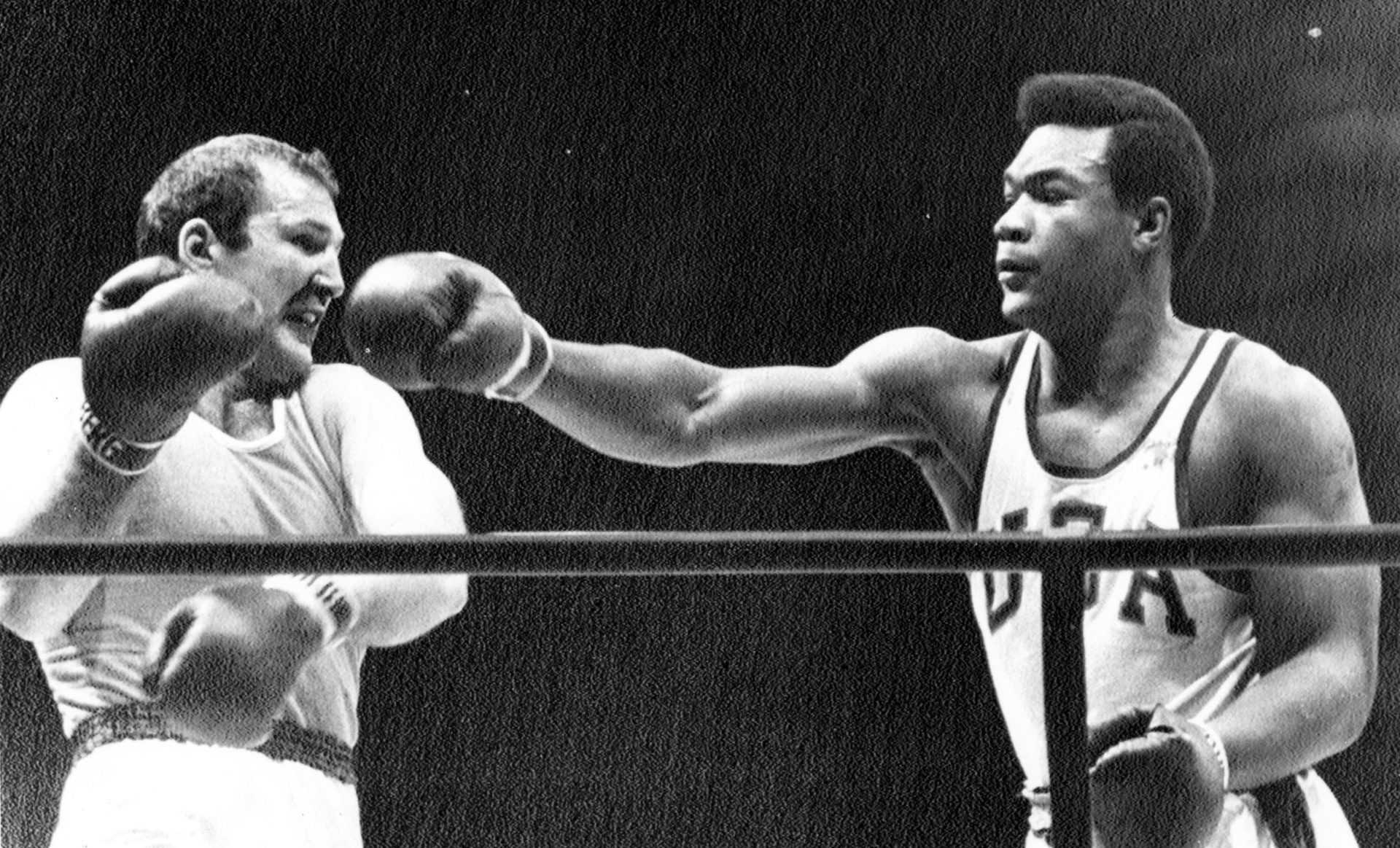 Mexico City Olympics 1968: George Foreman (r) of the USA lands a right hook on the chin of Russia's Iones Chepulis to win the gold medal.