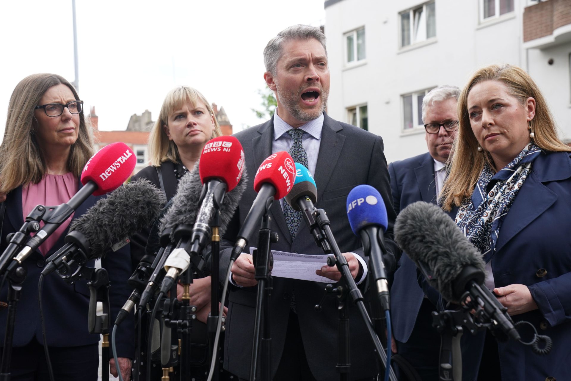 Director of BBC Northern Ireland, Adam Smyth (centre) outside the High Court in Dublin, after former Sinn Fein president Gerry Adams was awarded 100,000 euro in damages after winning his libel action against the BBC.
